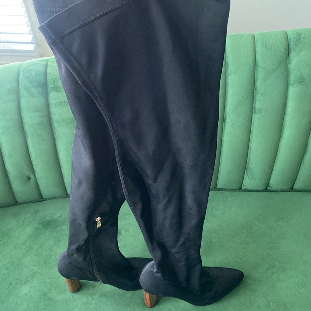 Thigh high black boots with chunky heels